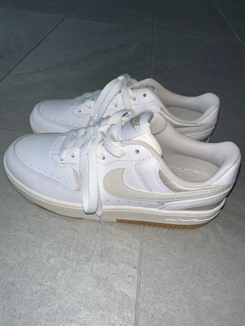 Nike White Sneakers with Cream Swoosh and Gum Outsole